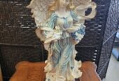 Angel figurine hard plastic with wood base 23 inches tall $30