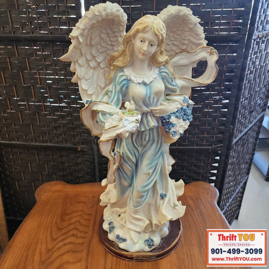 Angel figurine hard plastic with wood base 23 inches tall $30