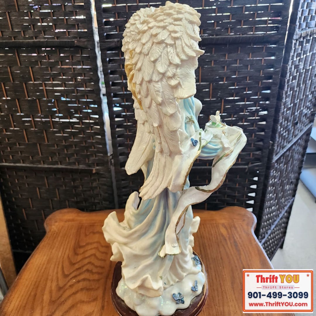 Angel figurine hard plastic with wood base 23 inches tall $30