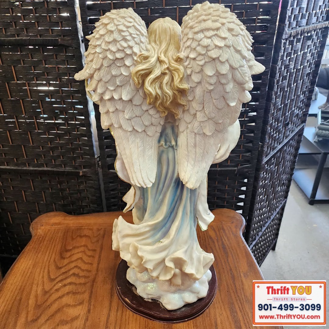 Angel figurine hard plastic with wood base 23 inches tall $30
