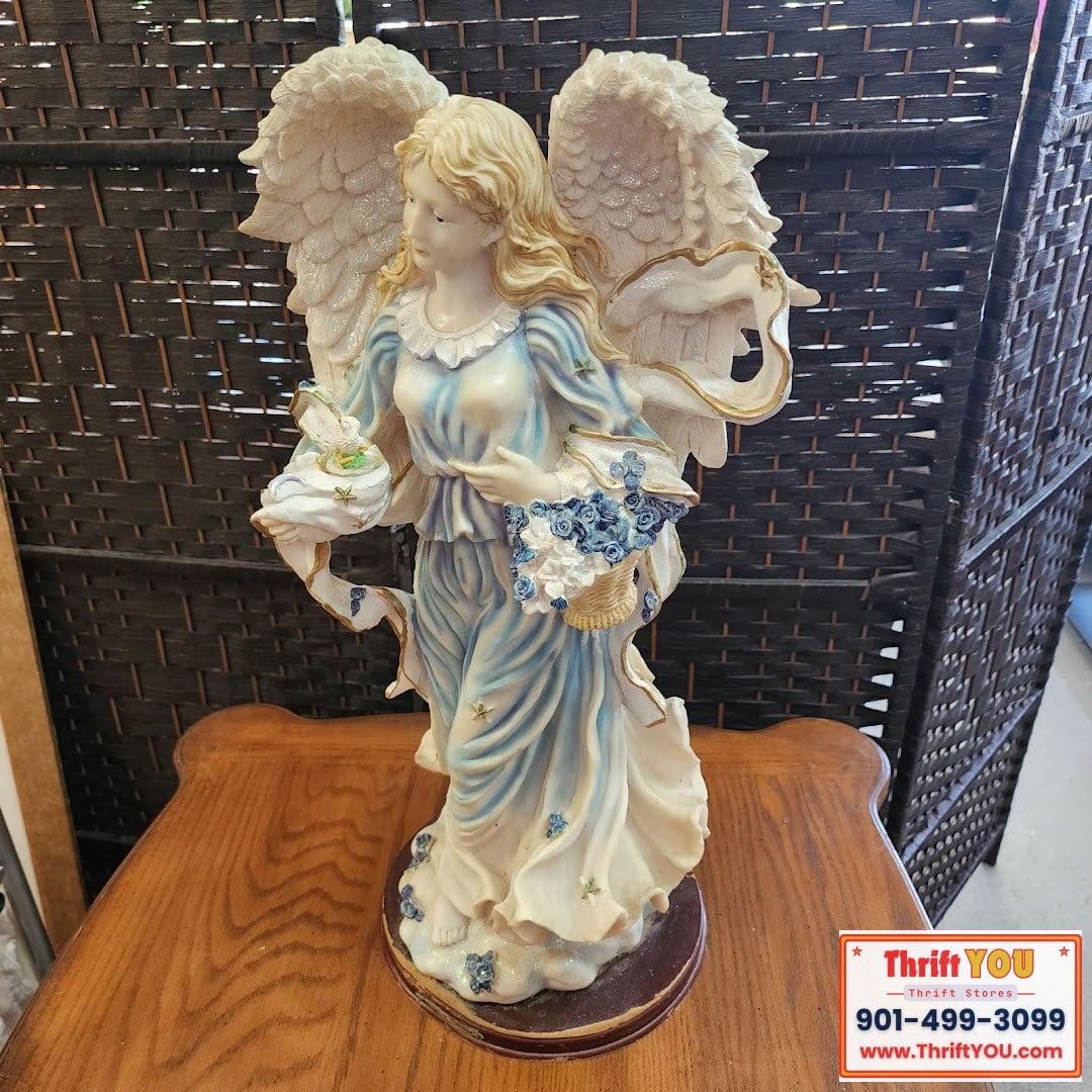 Angel figurine hard plastic with wood base 23 inches tall $30